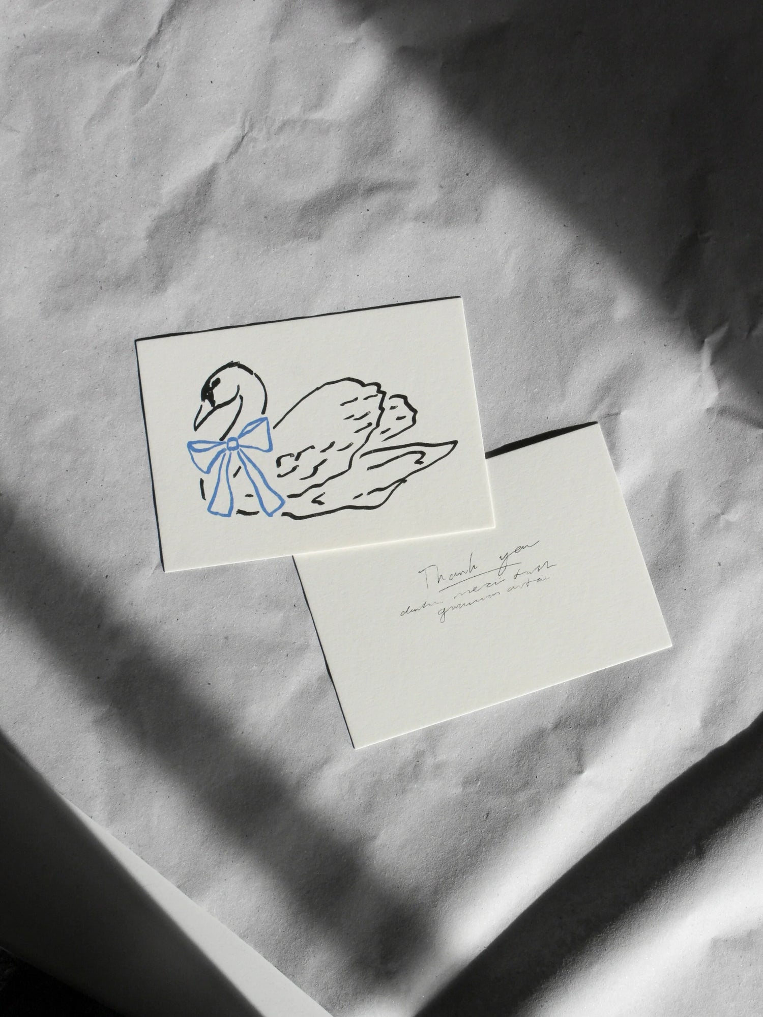 Postcard swan with bow