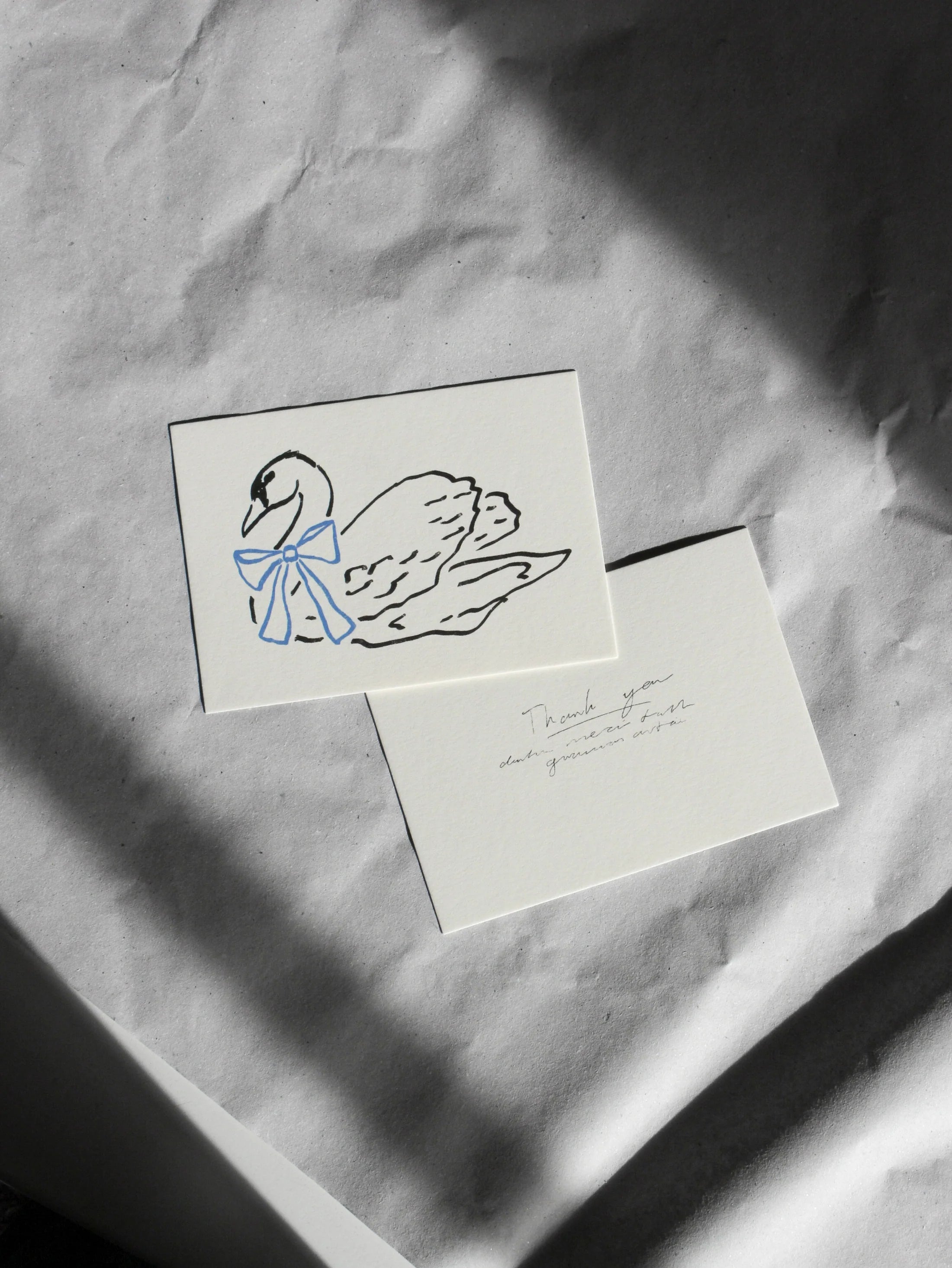 Postcard swan with bow