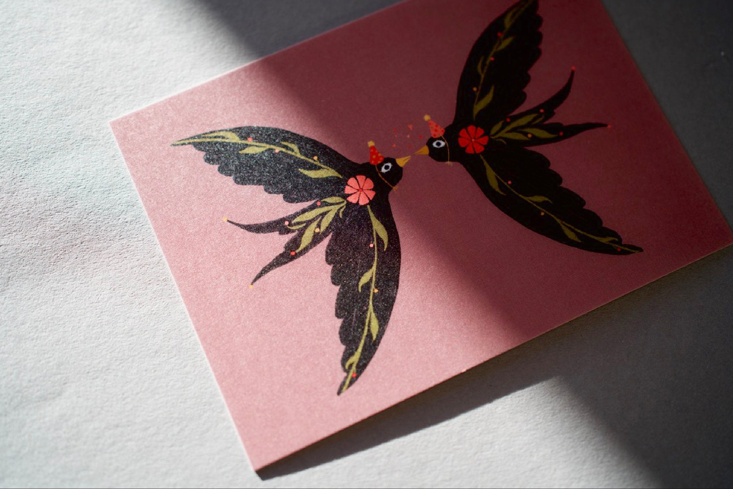 Postcard kissing swallows