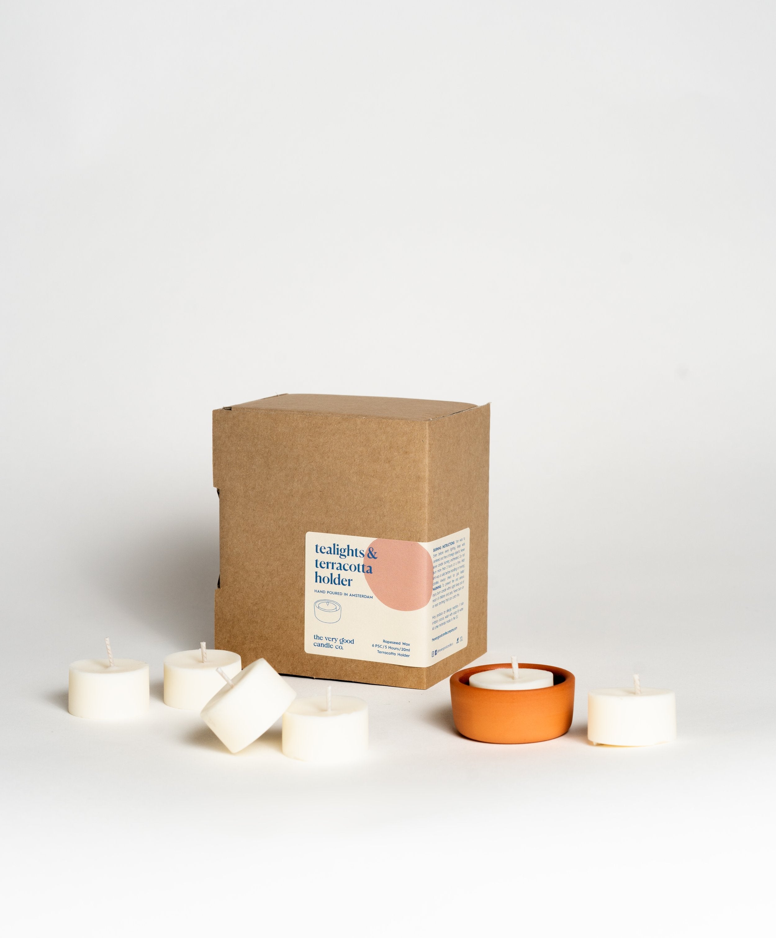Scented candles with terracotta tea light holder