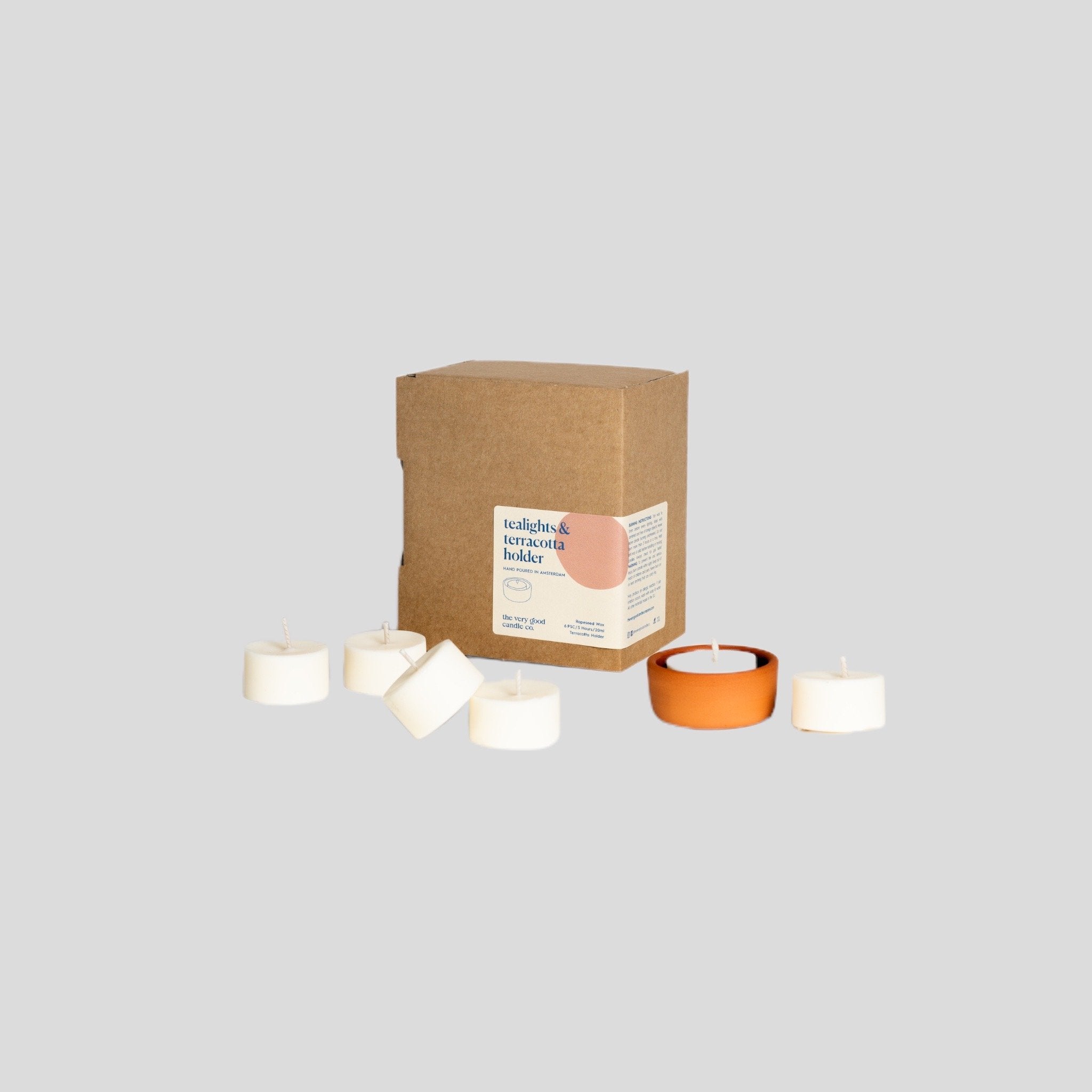 Scented candles with terracotta tea light holder