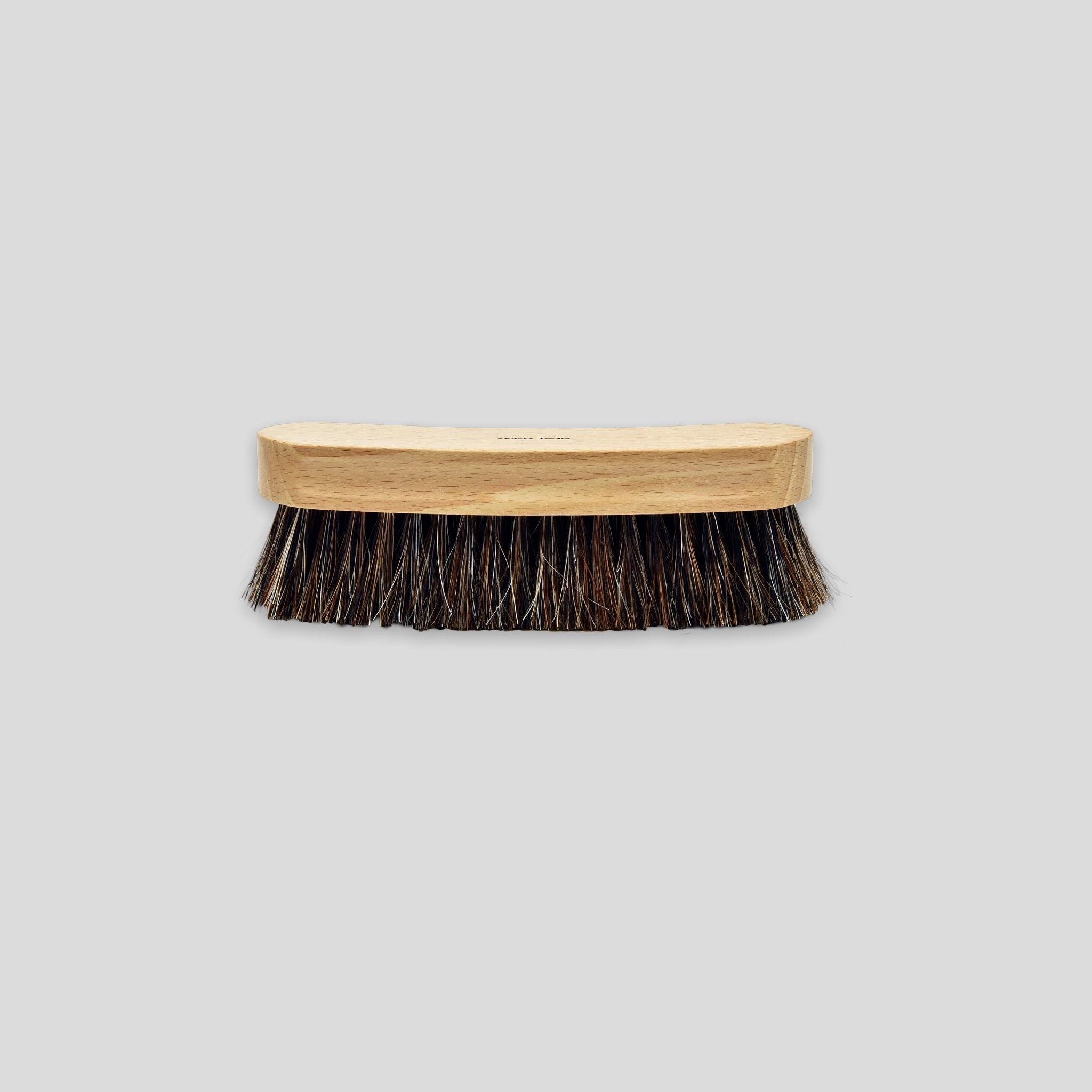 Shoe polishing brush